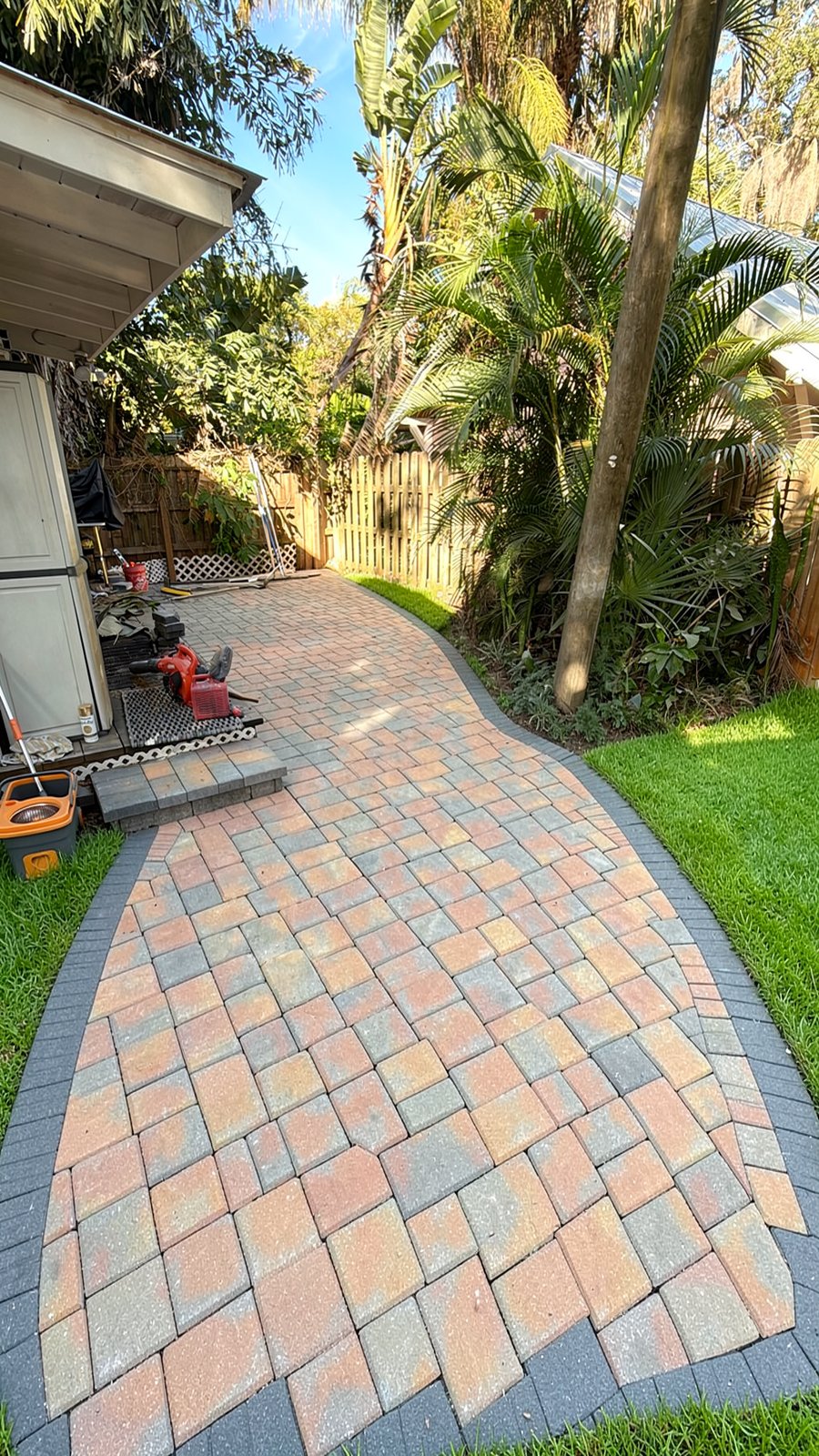 Design concept render of a paver or turf project — AI visualization, not a completed job