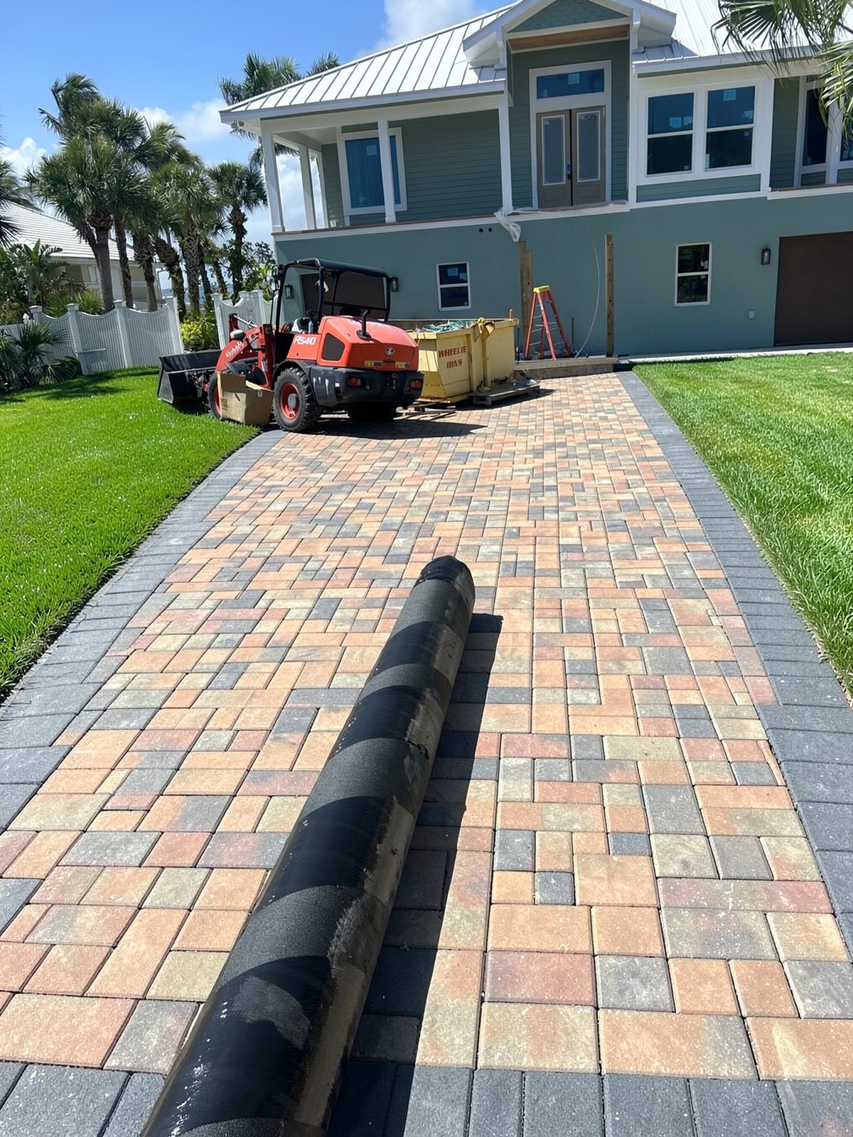 Design concept render of a paver or turf project — AI visualization, not a completed job