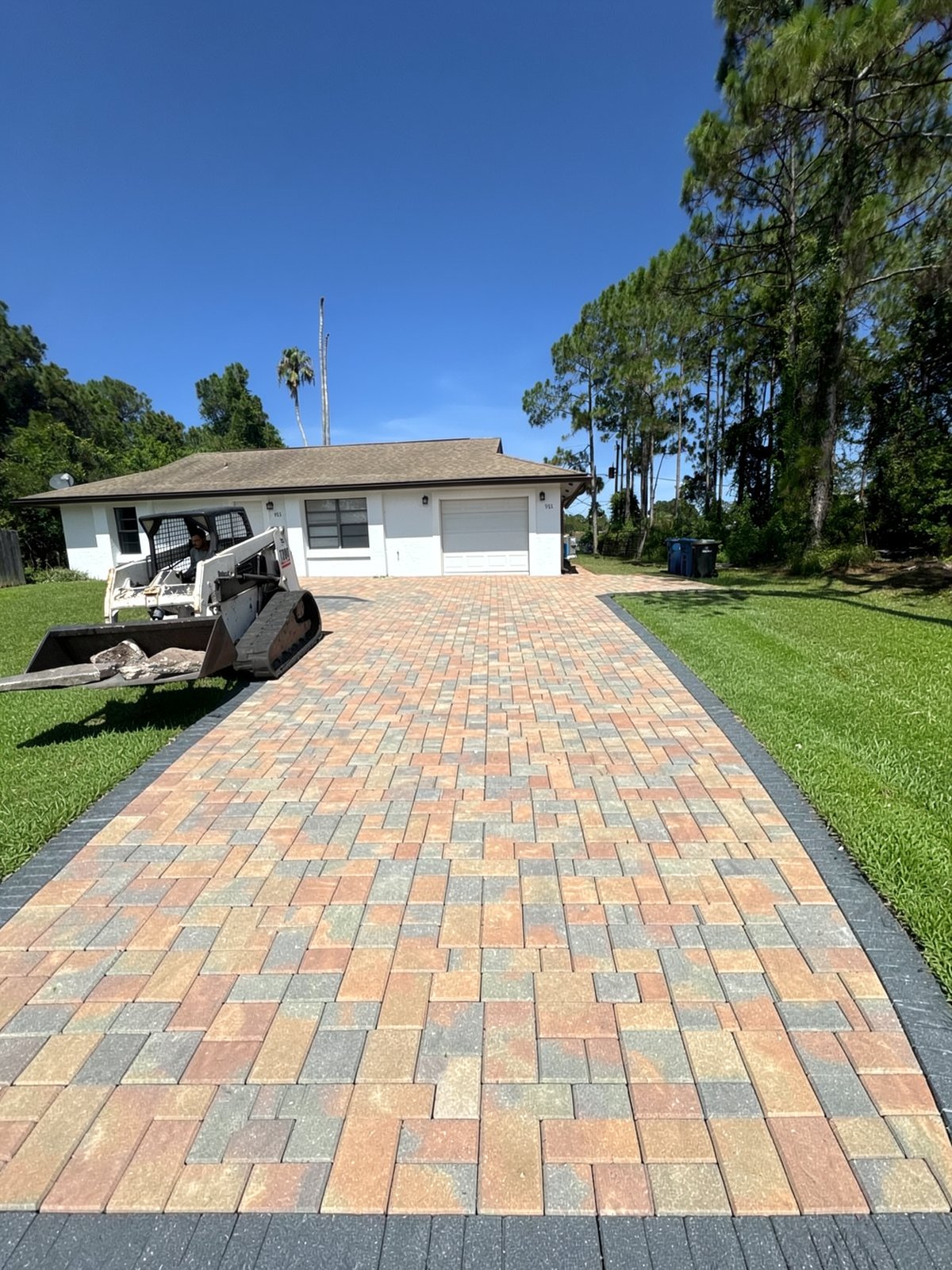 Design concept render of a paver or turf project — AI visualization, not a completed job