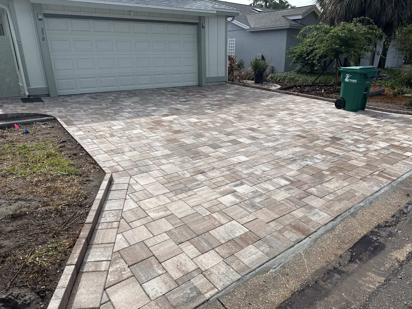 Completed paver and turf installation by Groundworks, Brevard County
