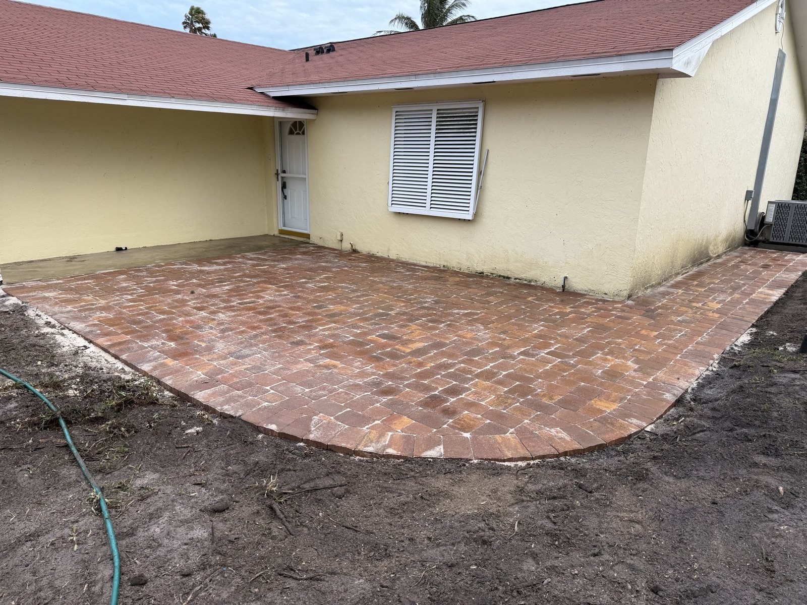 Completed paver and turf installation by Groundworks, Brevard County