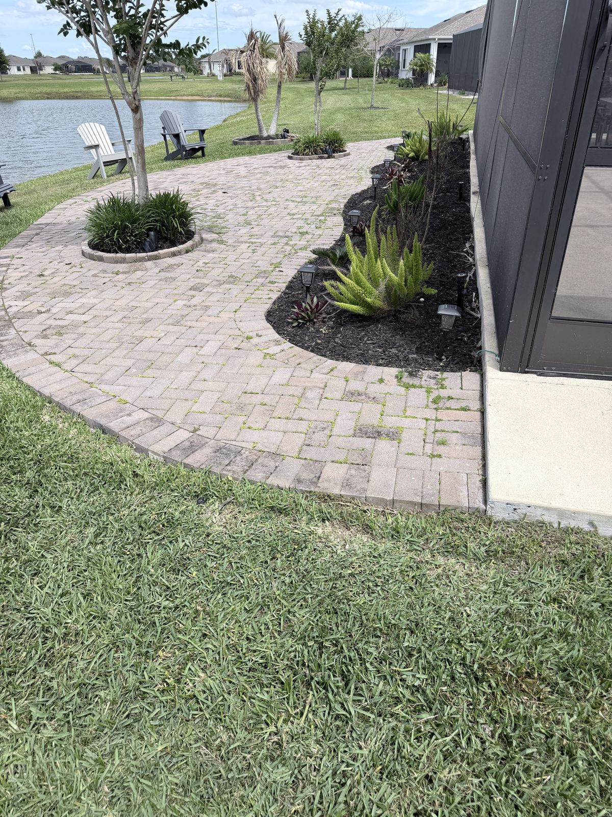 Paver surface cleaned and sealed by Groundworks, Brevard County
