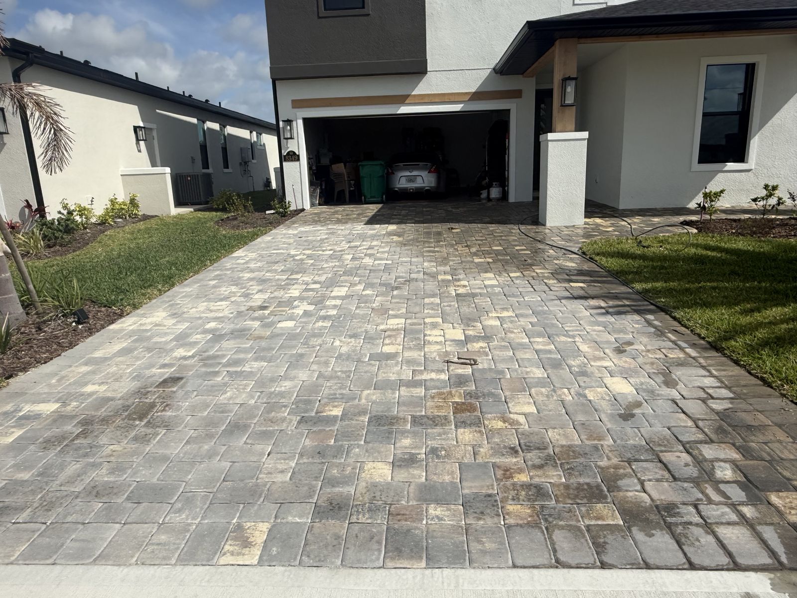 Paver surface cleaned and sealed by Groundworks, Brevard County
