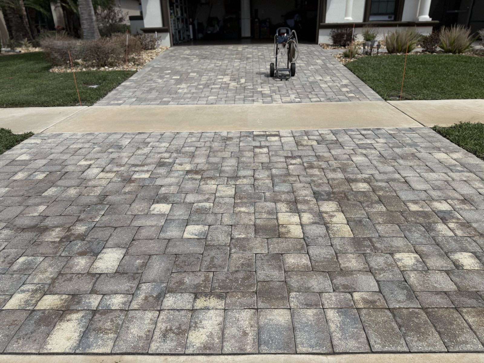 Paver surface cleaned and sealed by Groundworks, Brevard County
