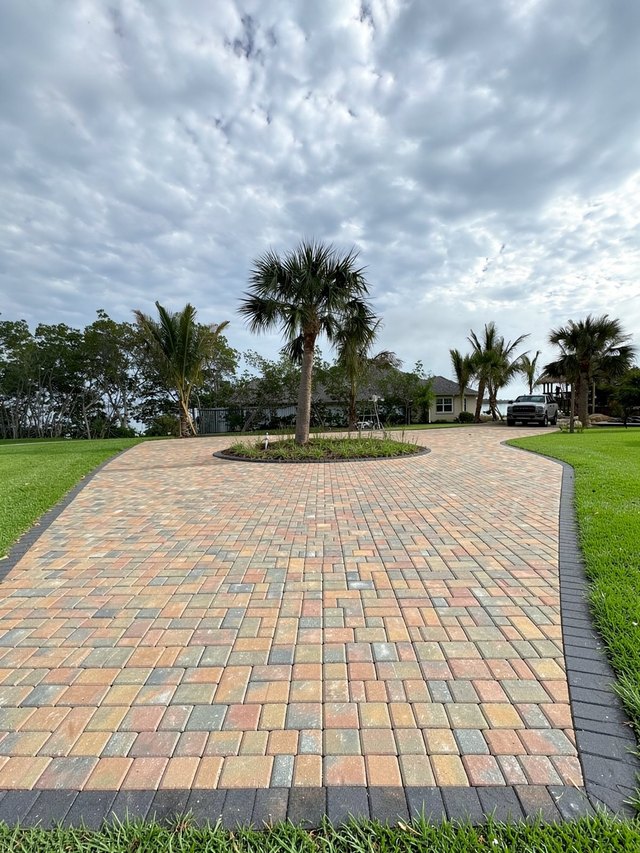 Design concept render of a paver or turf project — AI visualization, not a completed job
