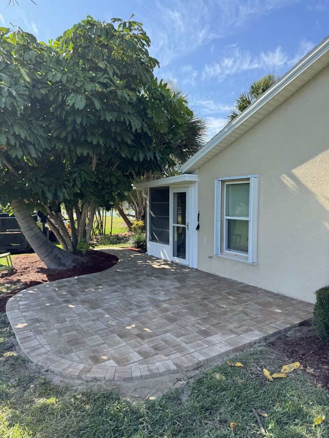 Completed paver and turf installation by Groundworks, Brevard County