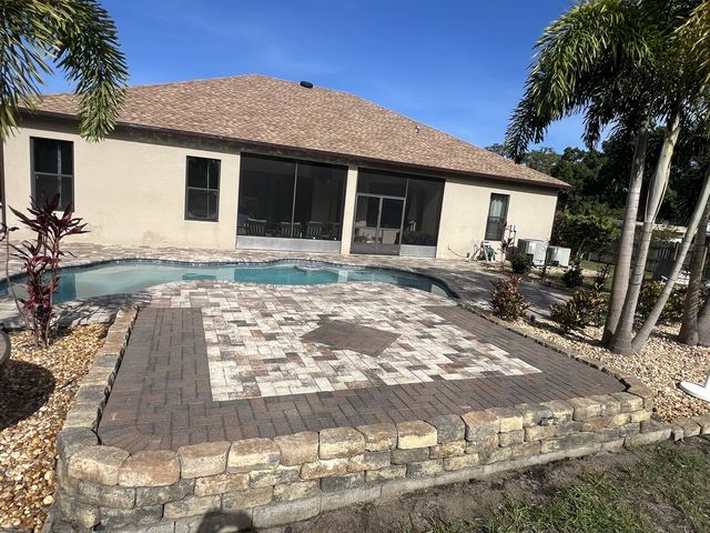 Paver surface cleaned and sealed by Groundworks, Brevard County