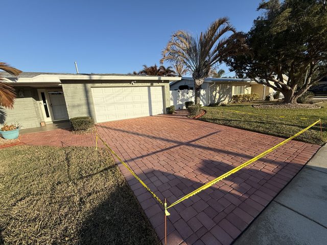 Paver surface cleaned and sealed by Groundworks, Brevard County