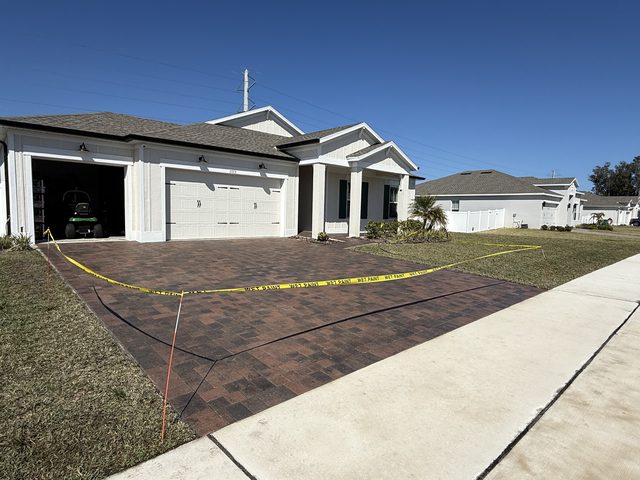 Paver surface cleaned and sealed by Groundworks, Brevard County